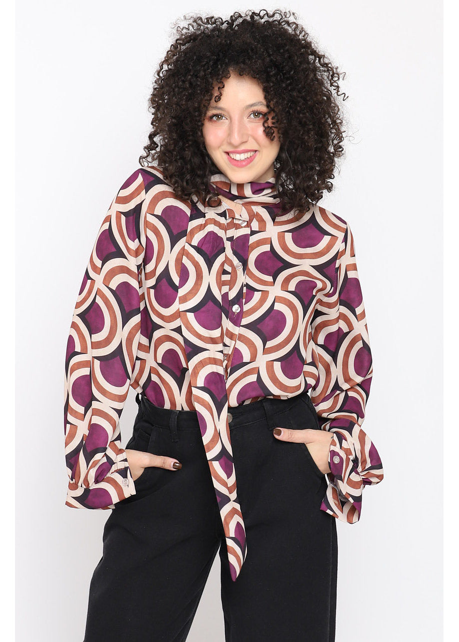 Blusa con fiocco stampa geometrica