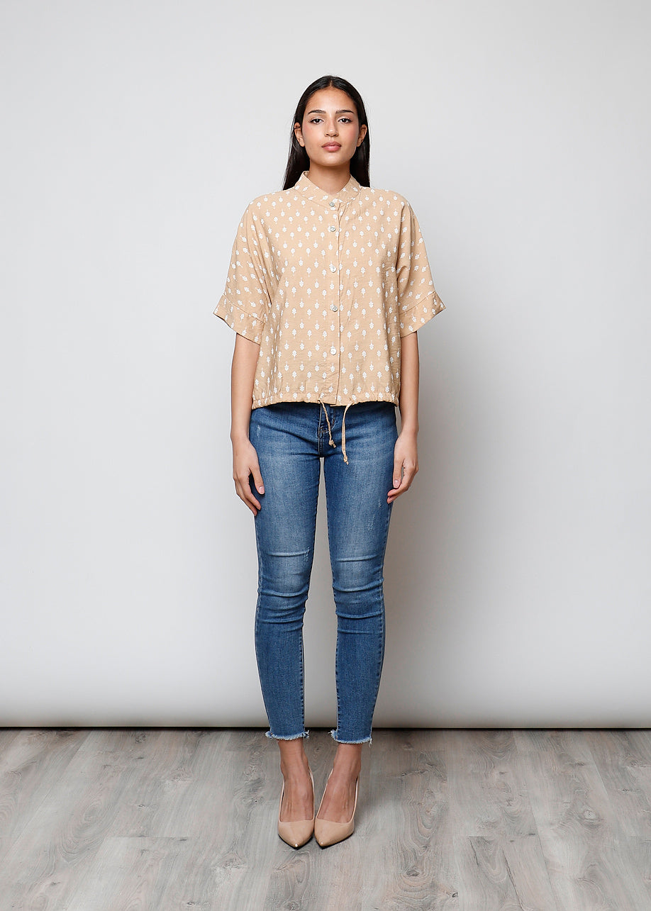 Blusa aperta con bottoni