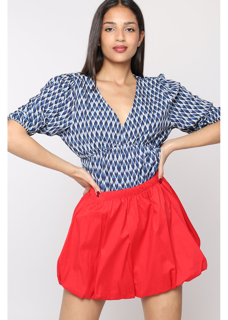 Blusa stampata con scollo a V