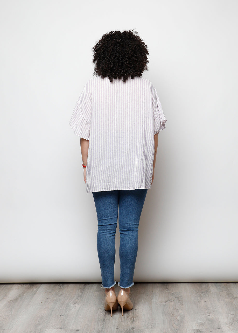 Blusa aperta con bottini rigata
