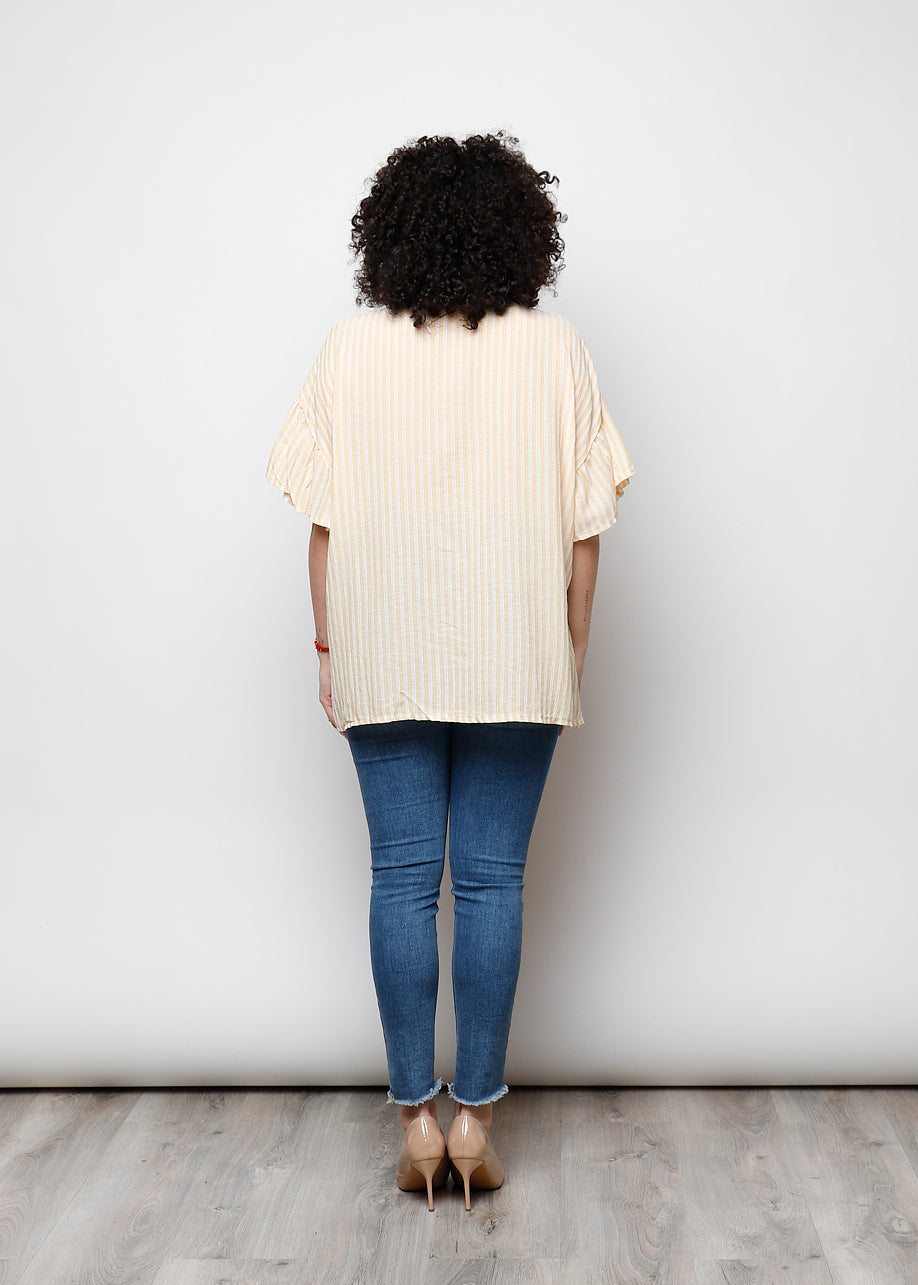 Blusa aperta con bottini rigata