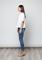 Blusa aperta con bottoni