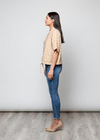 Blusa aperta con bottoni