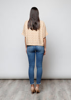 Blusa aperta con bottoni