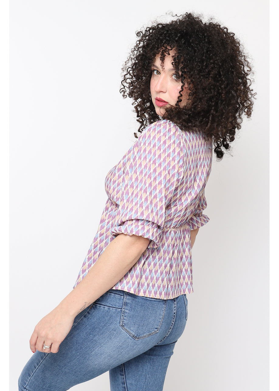 Blusa stampata con scollo a V