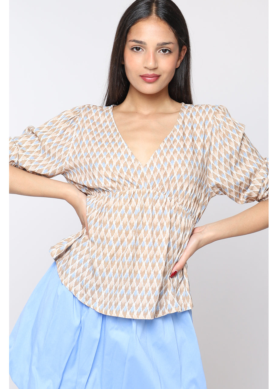 Blusa stampata con scollo a V