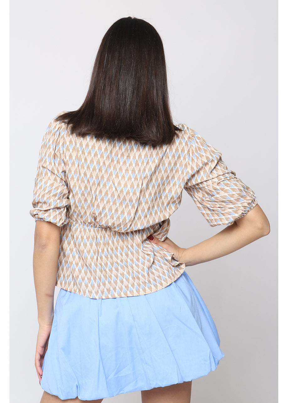 Blusa stampata con scollo a V