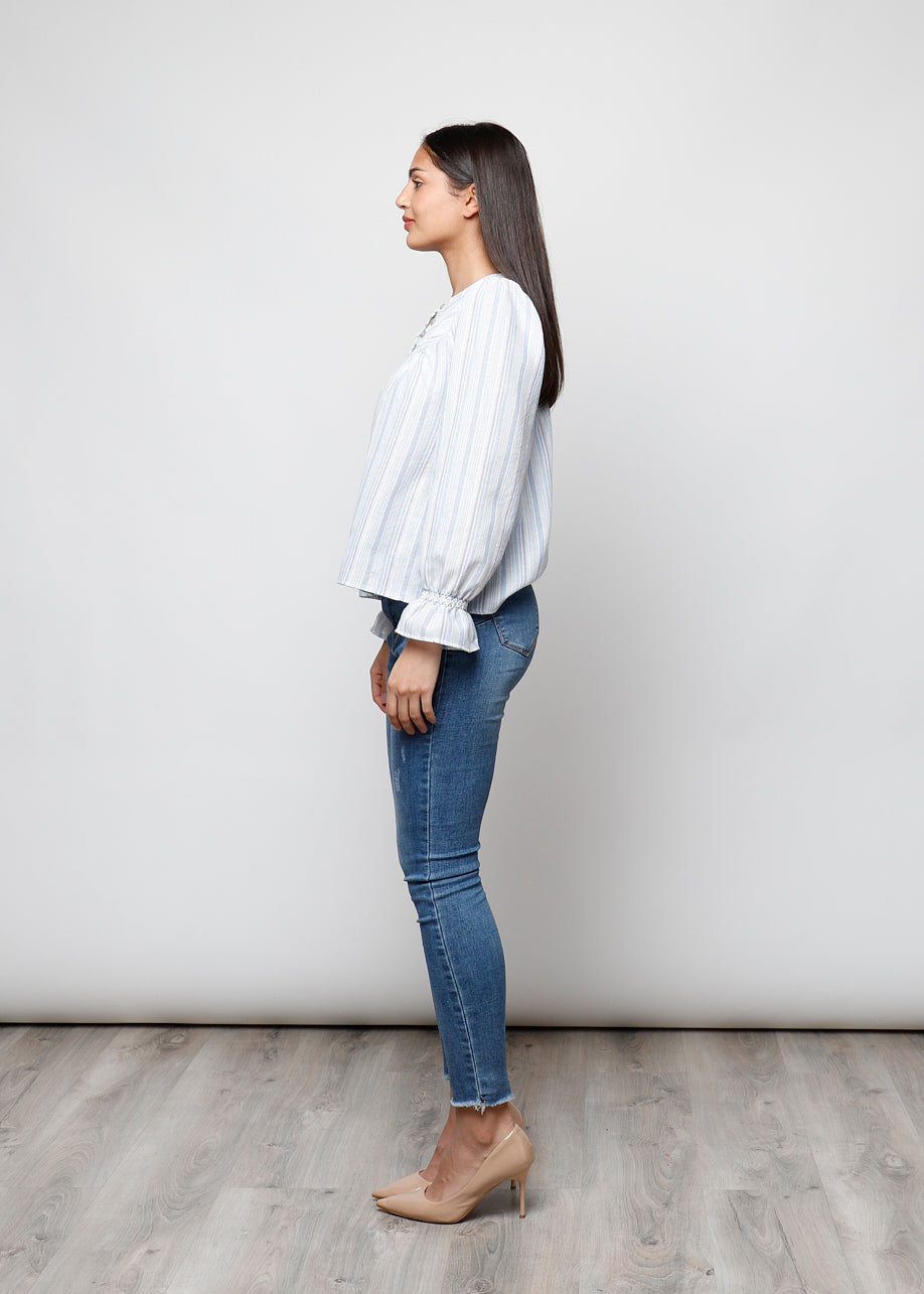 Blusa a manica lunga rigata
