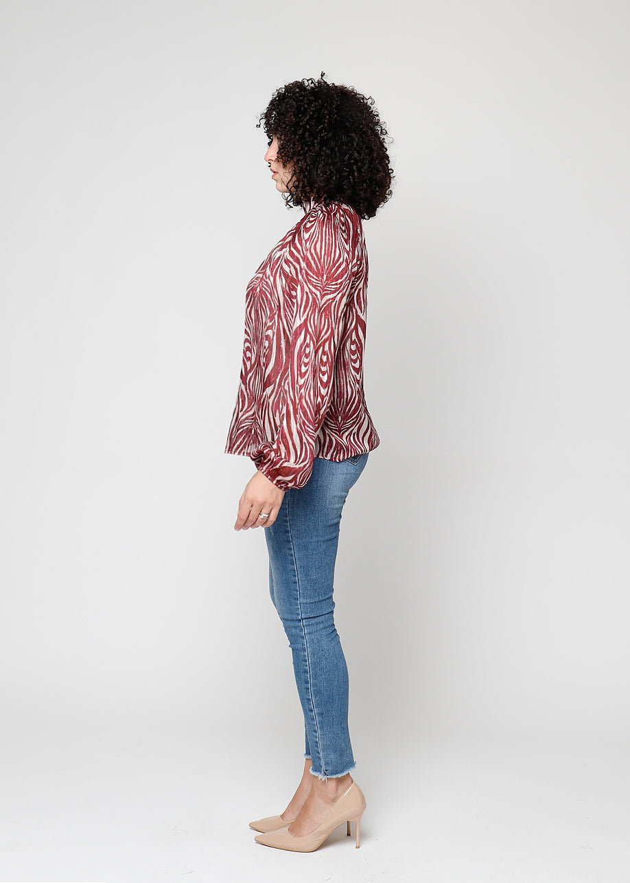 Blusa a manica lunga con filo lurex