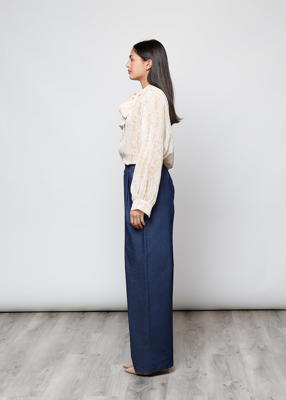 Camicia con fiocco, a manica lunga, stampa floreale con filo lurex.