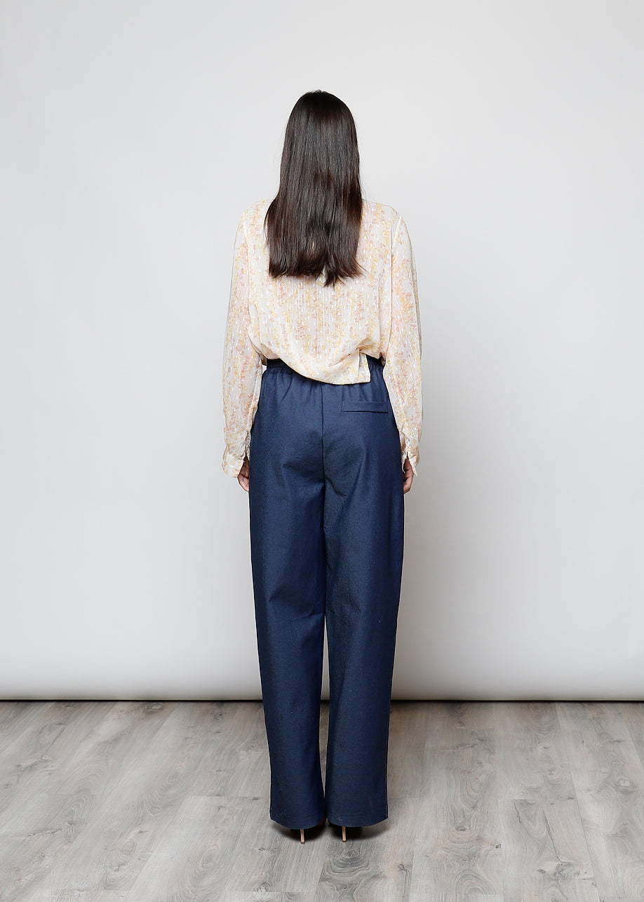 Camicia con fiocco, a manica lunga, stampa floreale con filo lurex.