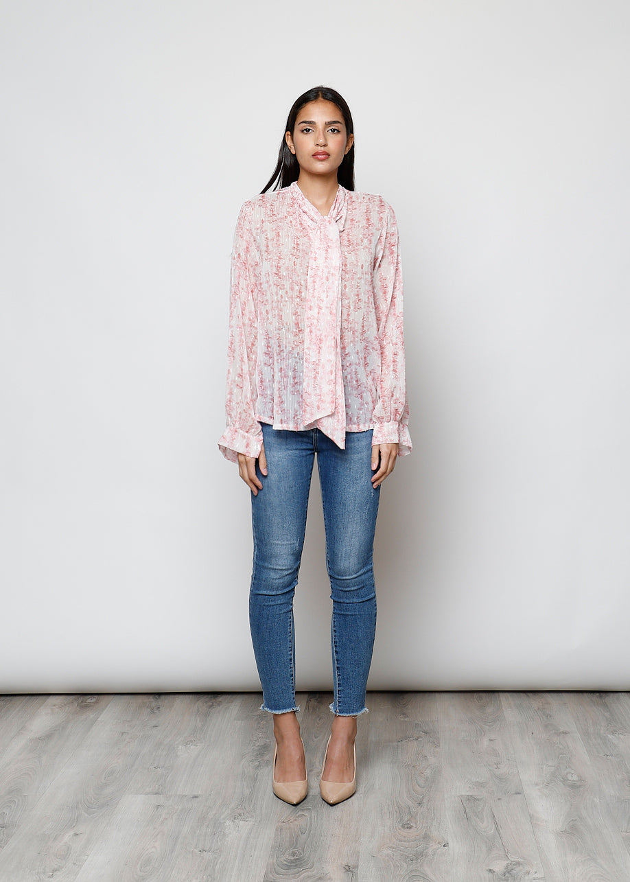 Camicia con fiocco, a manica lunga, stampa floreale con filo lurex.