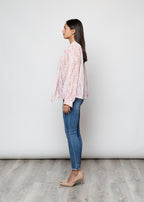 Camicia con fiocco, a manica lunga, stampa floreale con filo lurex.