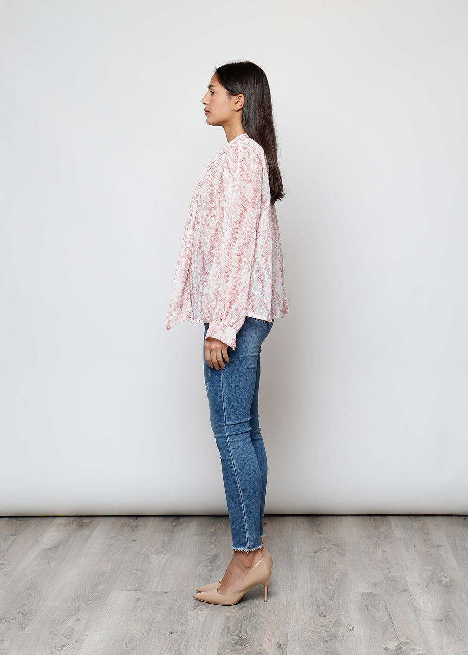 Camicia con fiocco, a manica lunga, stampa floreale con filo lurex.