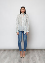 Camicia con fiocco, a manica lunga, stampa floreale con filo lurex.