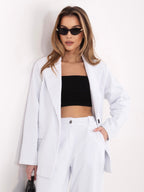 Pantaloni Carrot in Velluto a Coste Vita Alta (Bianca)